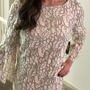 Nude dress with white floral lace overlay